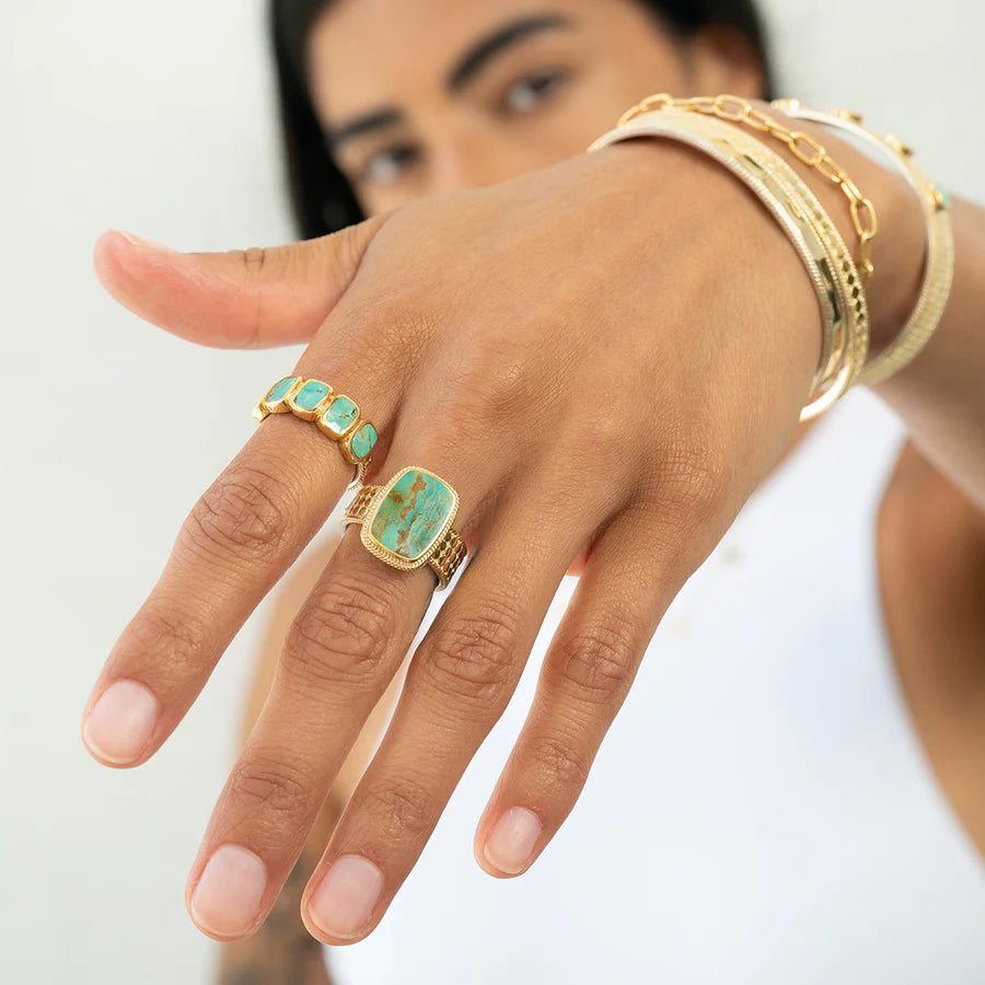 Anna Beck turquoise and gold rings. 